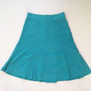 Pre owned scuba green skirt.